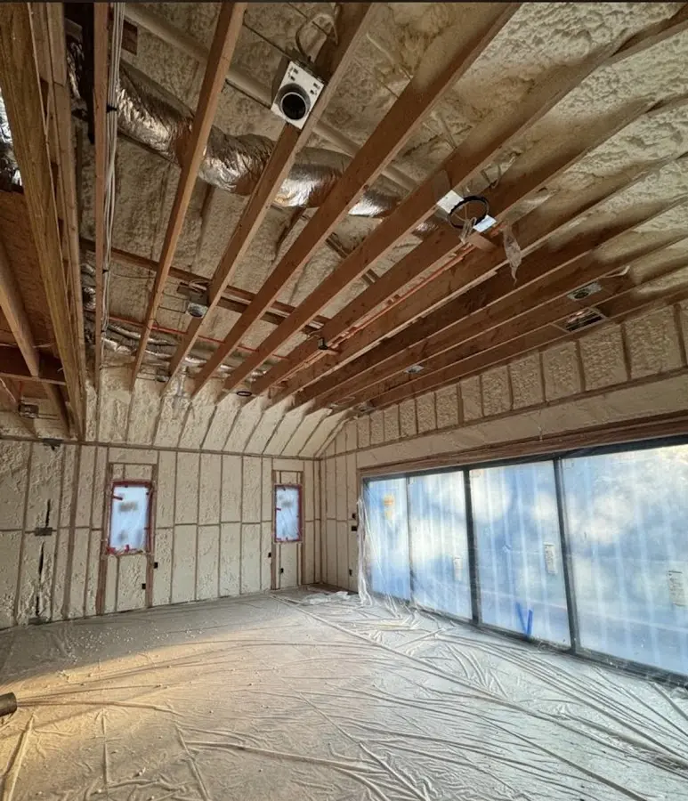 Interior walls and ceiling insulated with spray foam during new construction in Sumpter